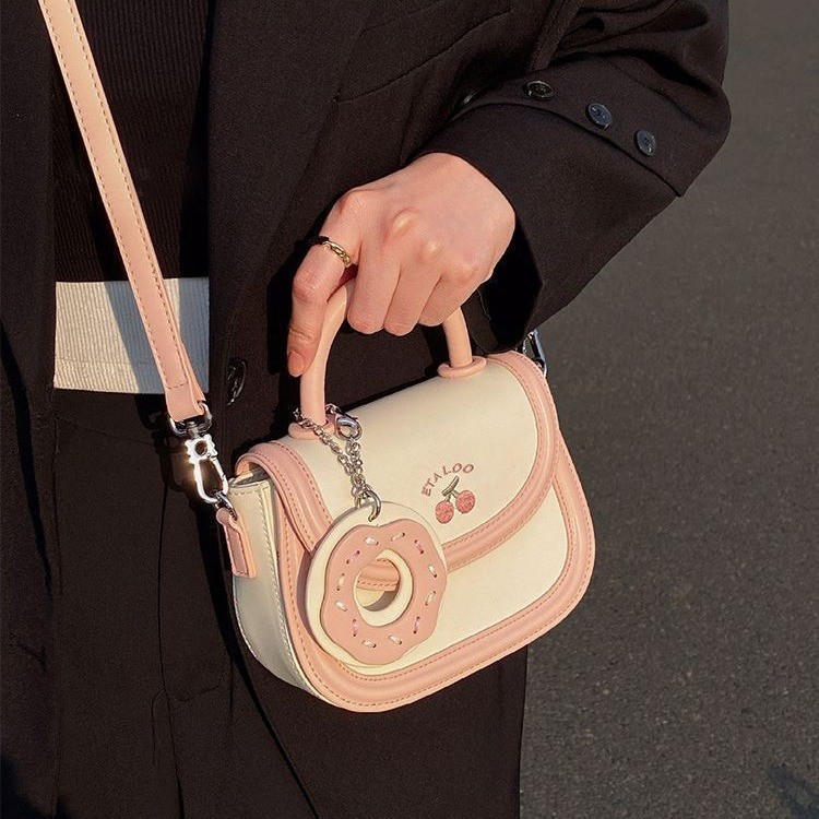 2025 new bag cute junior high school saddle bag Japanese biscuits rice white bill shoulder crossbody bag female spring and summer