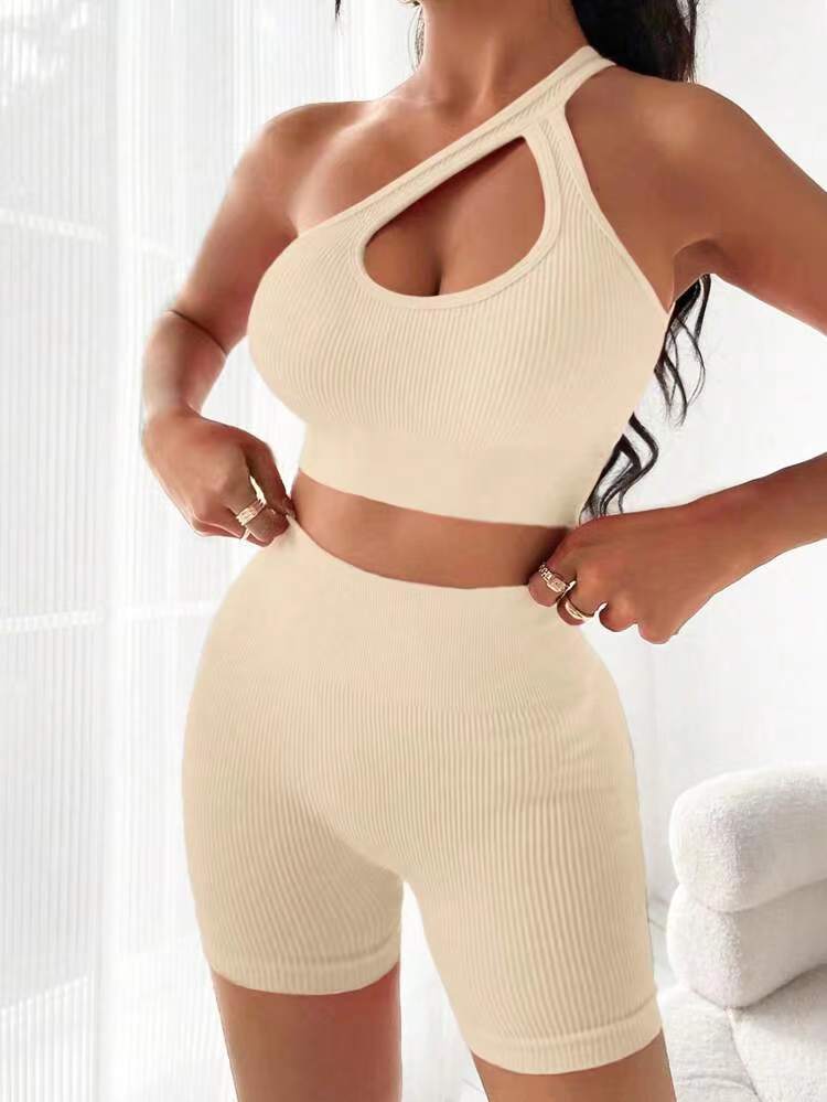 European and American women's threaded hollow sloping shoulder sexy bra seamless yoga suit peach hip shorts fitness set training sportswear