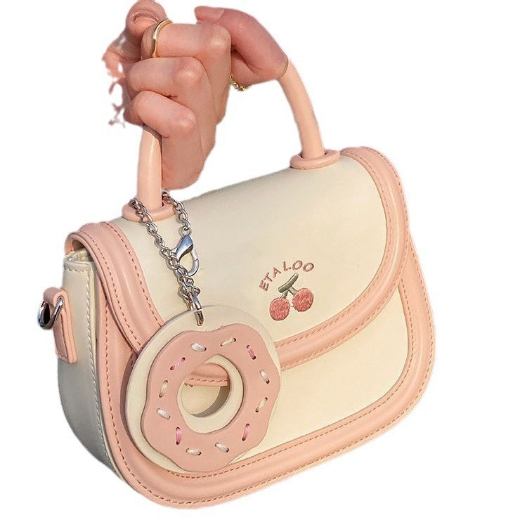 2025 new bag cute junior high school saddle bag Japanese biscuits rice white bill shoulder crossbody bag female spring and summer