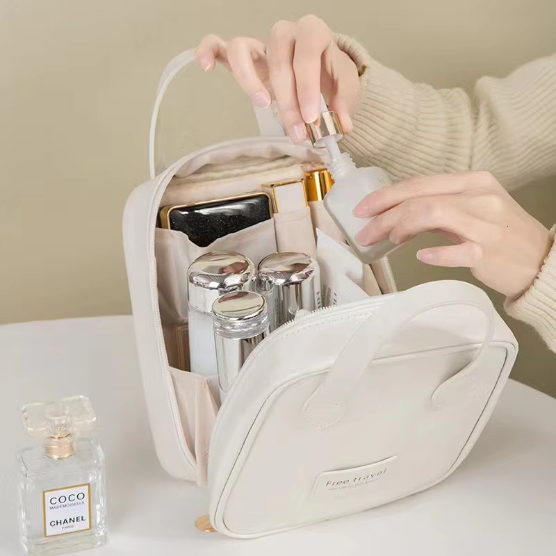 New women's fashion Shell portable makeup large-capacity PU leather waterproof storage travel wash cosmetic bag swissmilitary