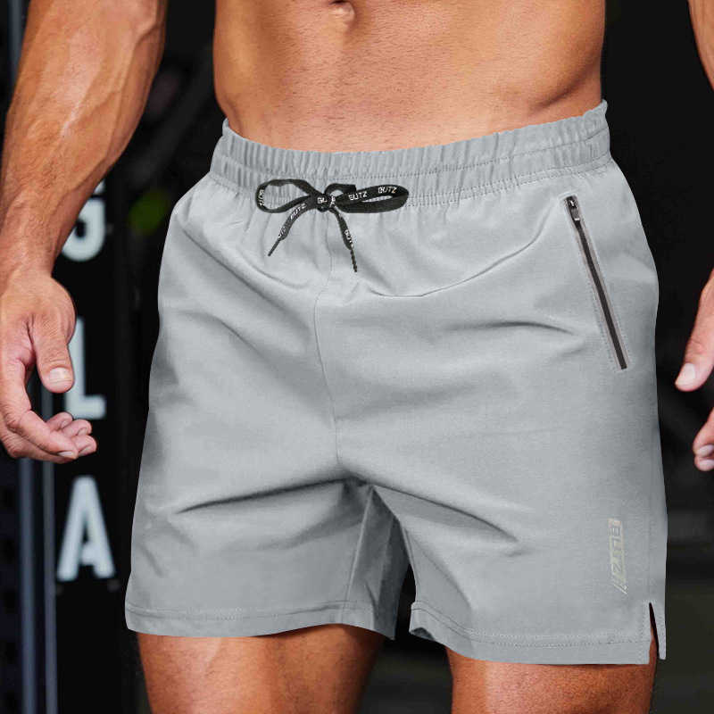 2024 summer new mens shorts European size casual loose sports mens five quarter pants trend W250212