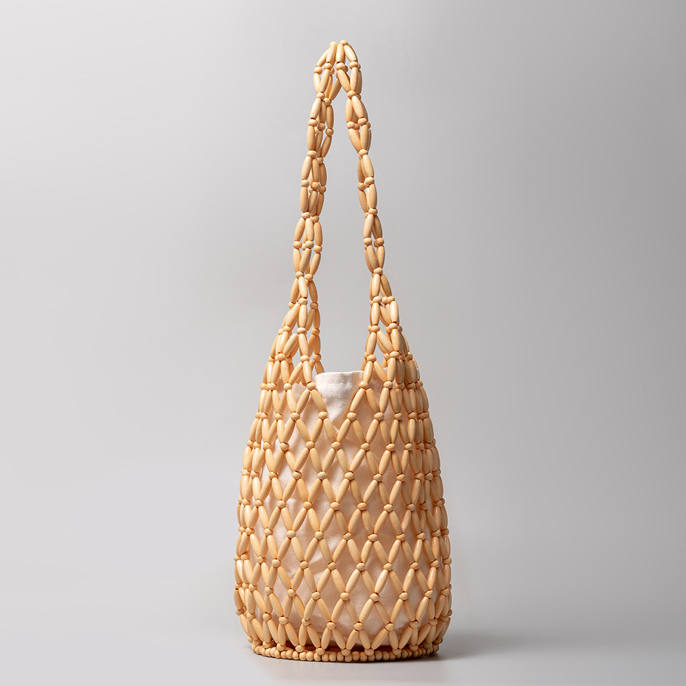 Stylish Women's Weave Bag Featuring Unique Wooden Bead Detailing Versatile Bucket Design