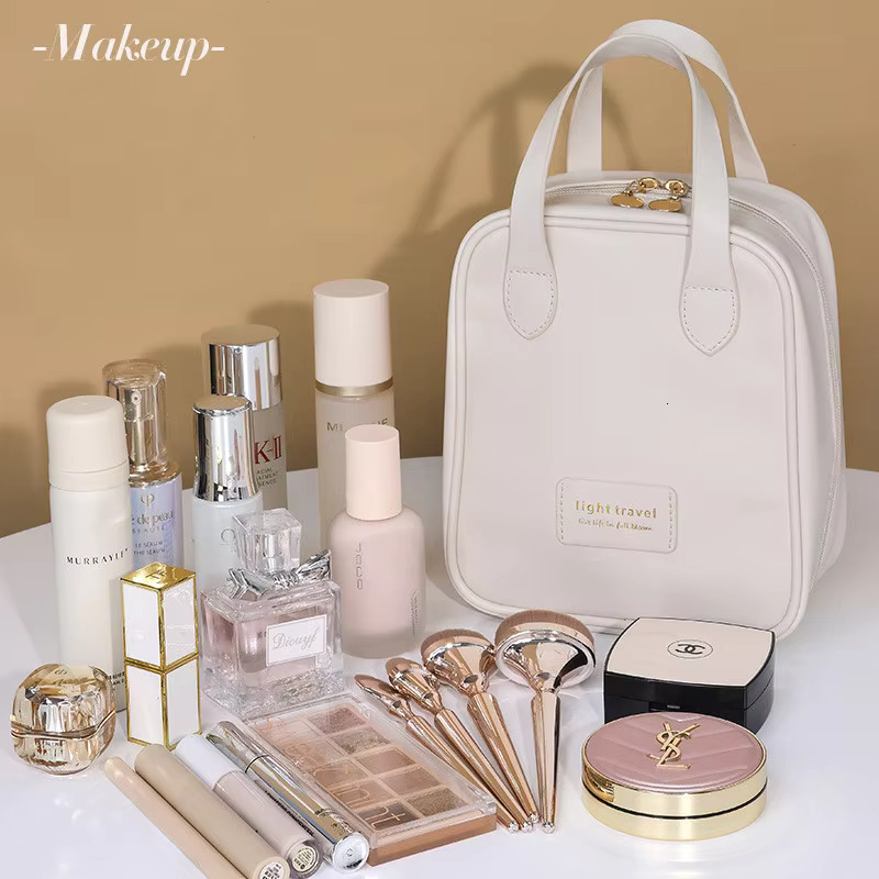 New women's fashion Shell portable makeup large-capacity PU leather waterproof storage travel wash cosmetic bag swissmilitary