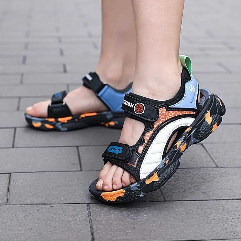 Sandals Childrens sandals 2024 summer new boys non-slip Velcro girls big children sports beach shoes soft soles wear trend H250212