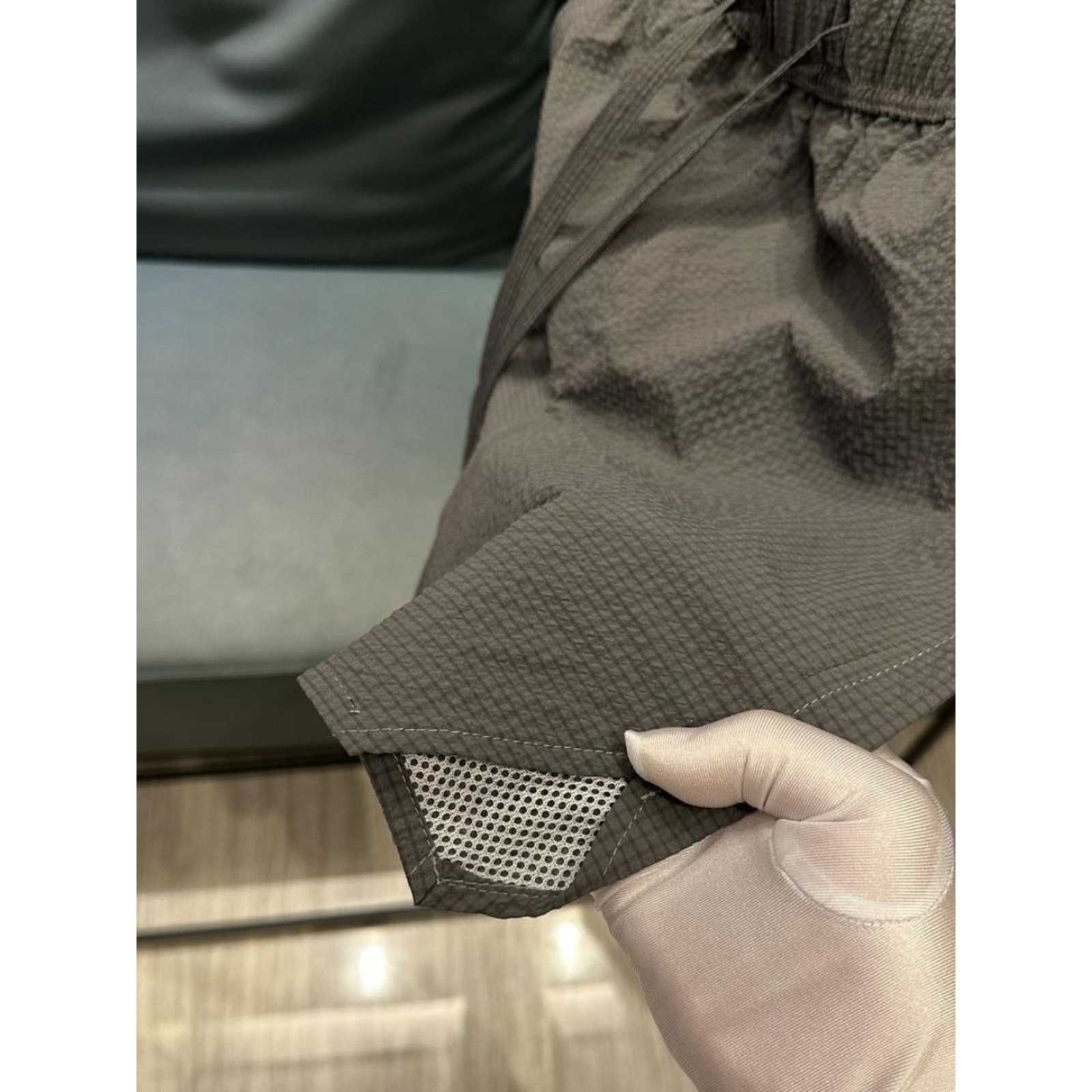Summer new trend breathable quick drying casual shorts for men solid color simple and fashionable versatile loose Haren five quarter pants W250212