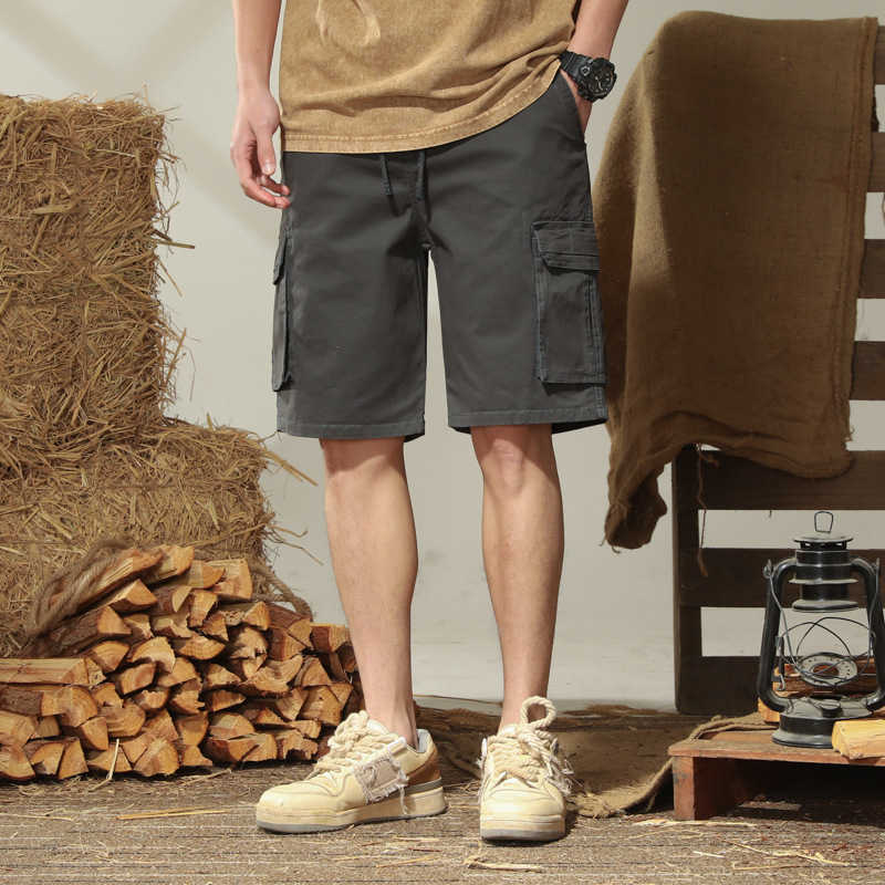 Half length washed casual pants mens loose work pants mens multi pocket pants sports shorts cotton elastic pants W250212