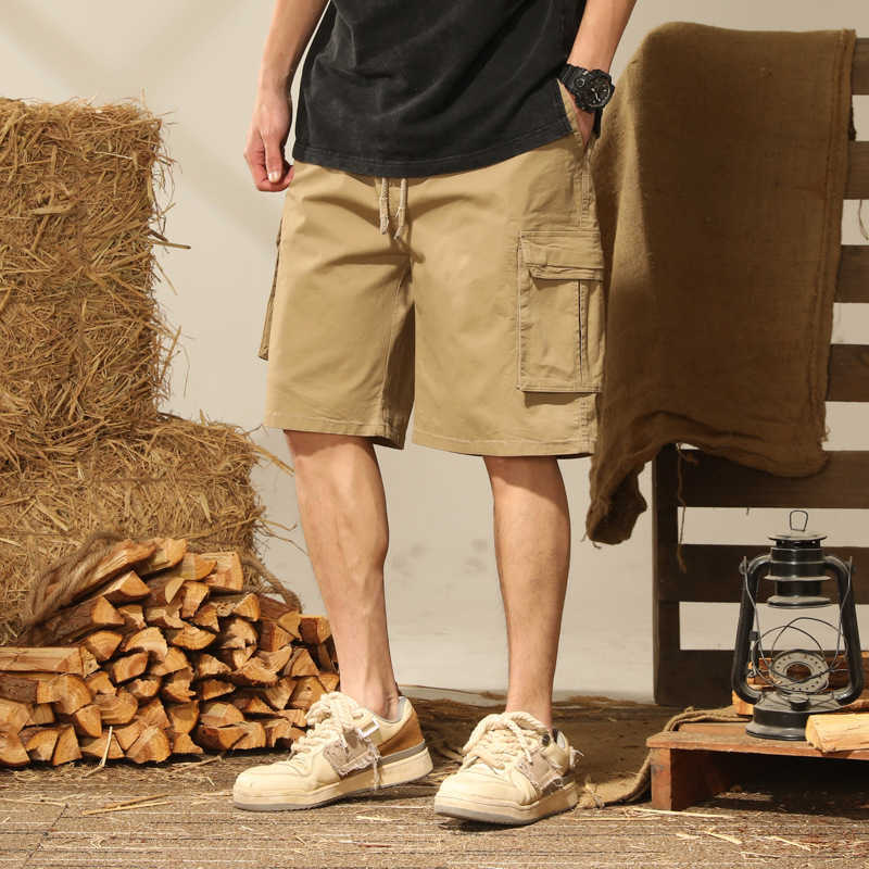Half length washed casual pants mens loose work pants mens multi pocket pants sports shorts cotton elastic pants W250212