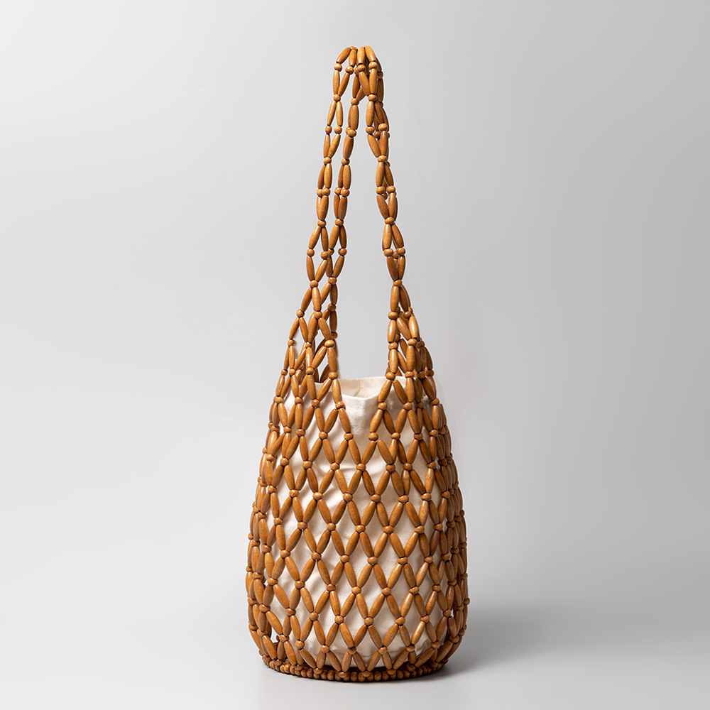Stylish Women's Weave Bag Featuring Unique Wooden Bead Detailing Versatile Bucket Design