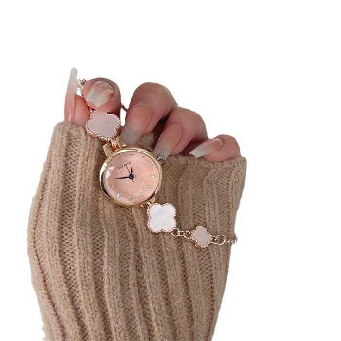 Watch with a clear and cool feeling niche design cold and cool style forest style camellia 2024 new model high-end feeling internet celebrity same sty