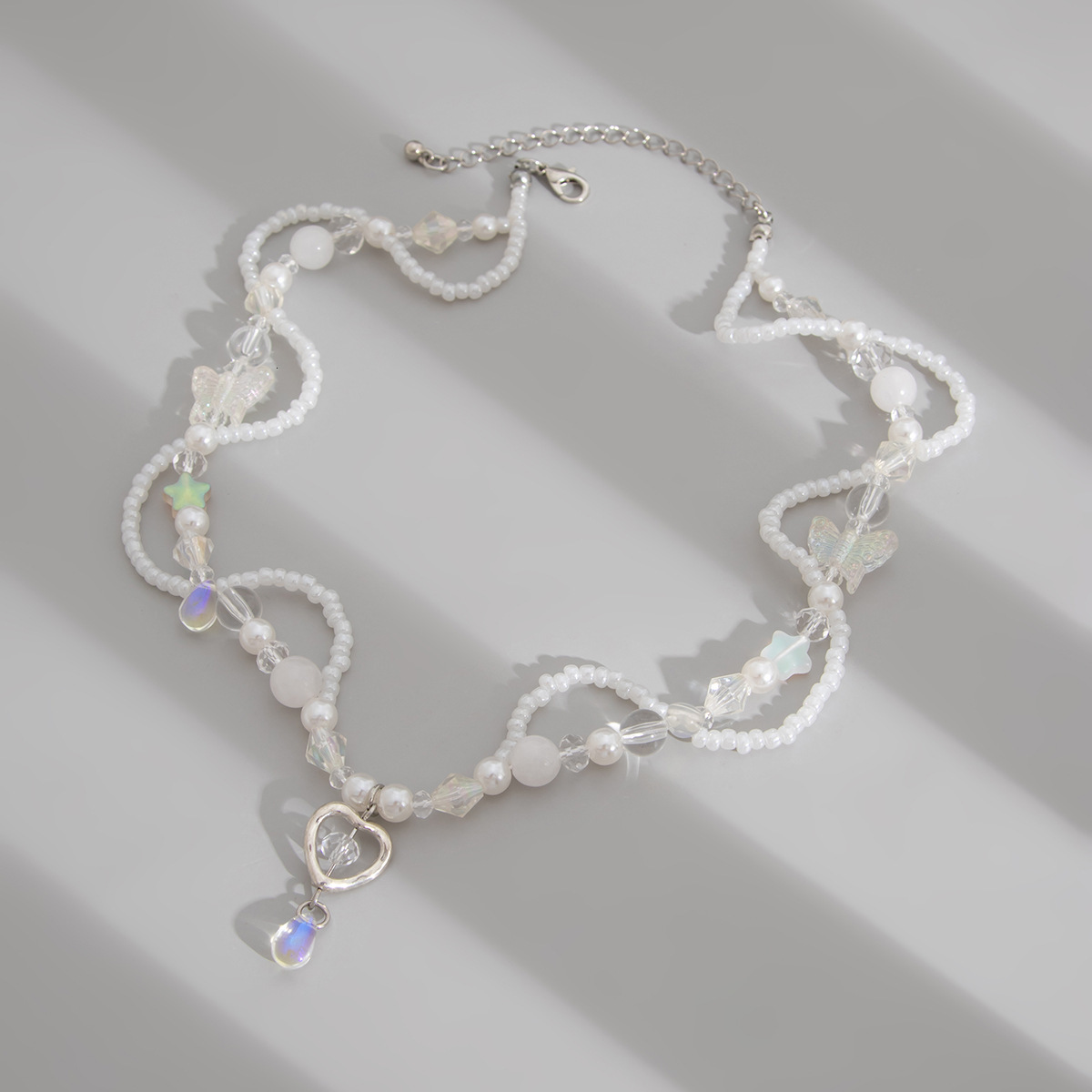 Woman fashion Jewelry small fresh irregular rice bead necklace sweet heart alloy designer pendant collarbone chain