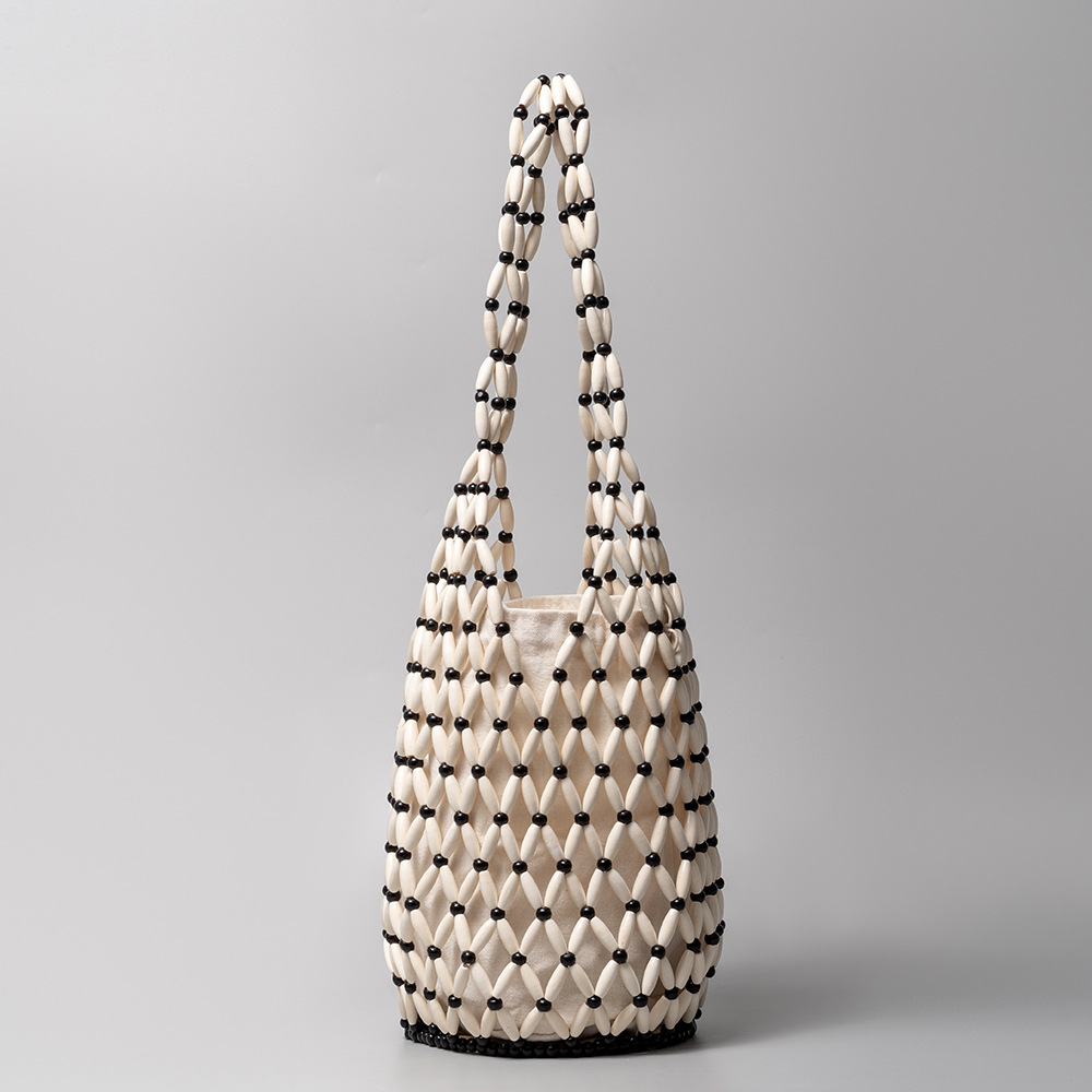 Stylish Women's Weave Bag Featuring Unique Wooden Bead Detailing Versatile Bucket Design