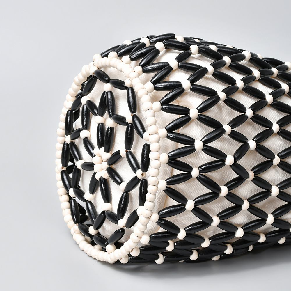 Stylish Women's Weave Bag Featuring Unique Wooden Bead Detailing Versatile Bucket Design