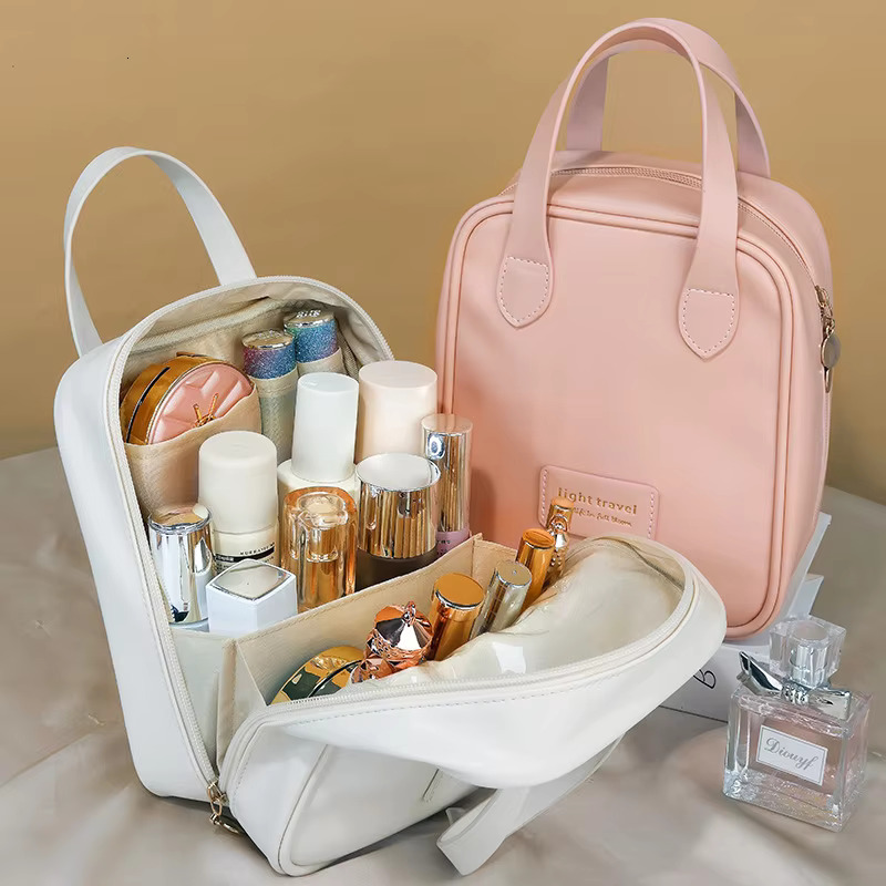 New women's fashion Shell portable makeup large-capacity PU leather waterproof storage travel wash cosmetic bag swissmilitary
