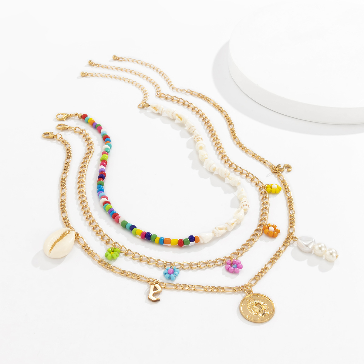 Countryside splicing asymmetrical shell imitation pearl geometric letters contrasting daisy rice bead designer necklace