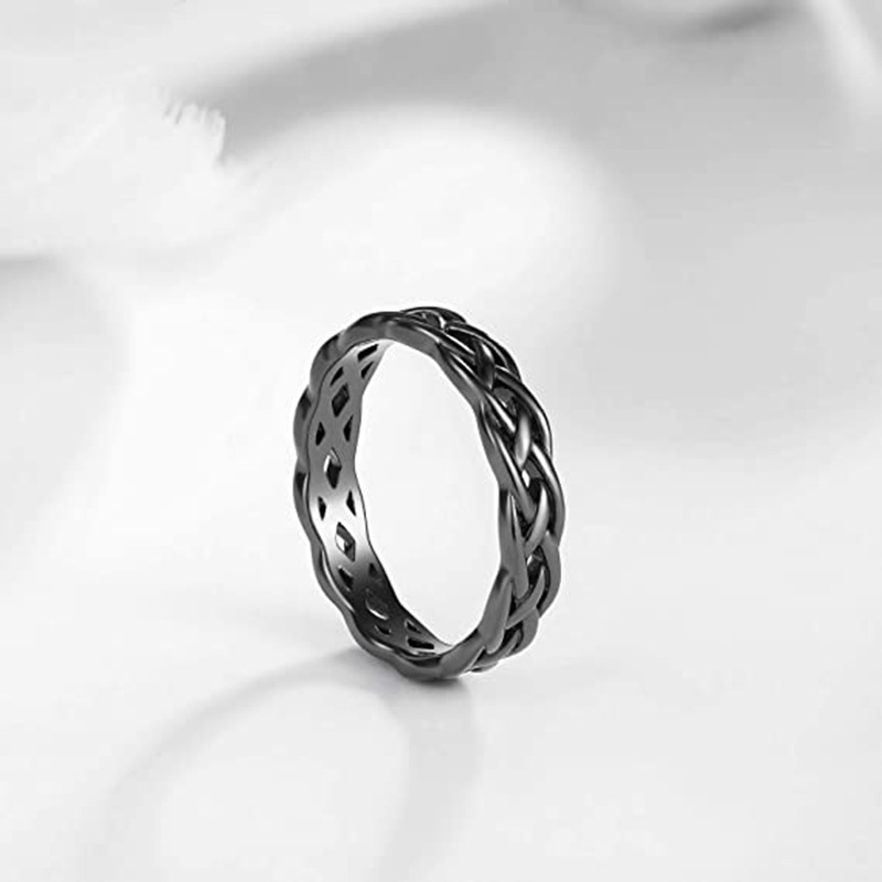 Europe and the United States fashion titanium steel jewelry minimalist weaving hollow wave effect Celtic knot couple ring love ring gold ring designer