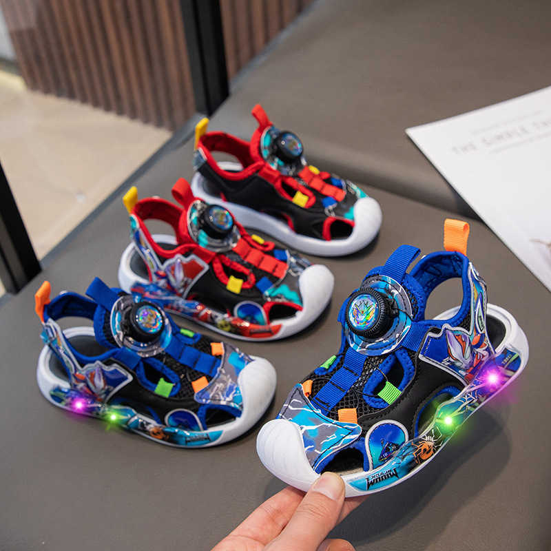 Sandals Childrens beach shoes boys sports sandals Ultraman summer hollow mesh illuminated anti kick cartoon frame shoes H250212