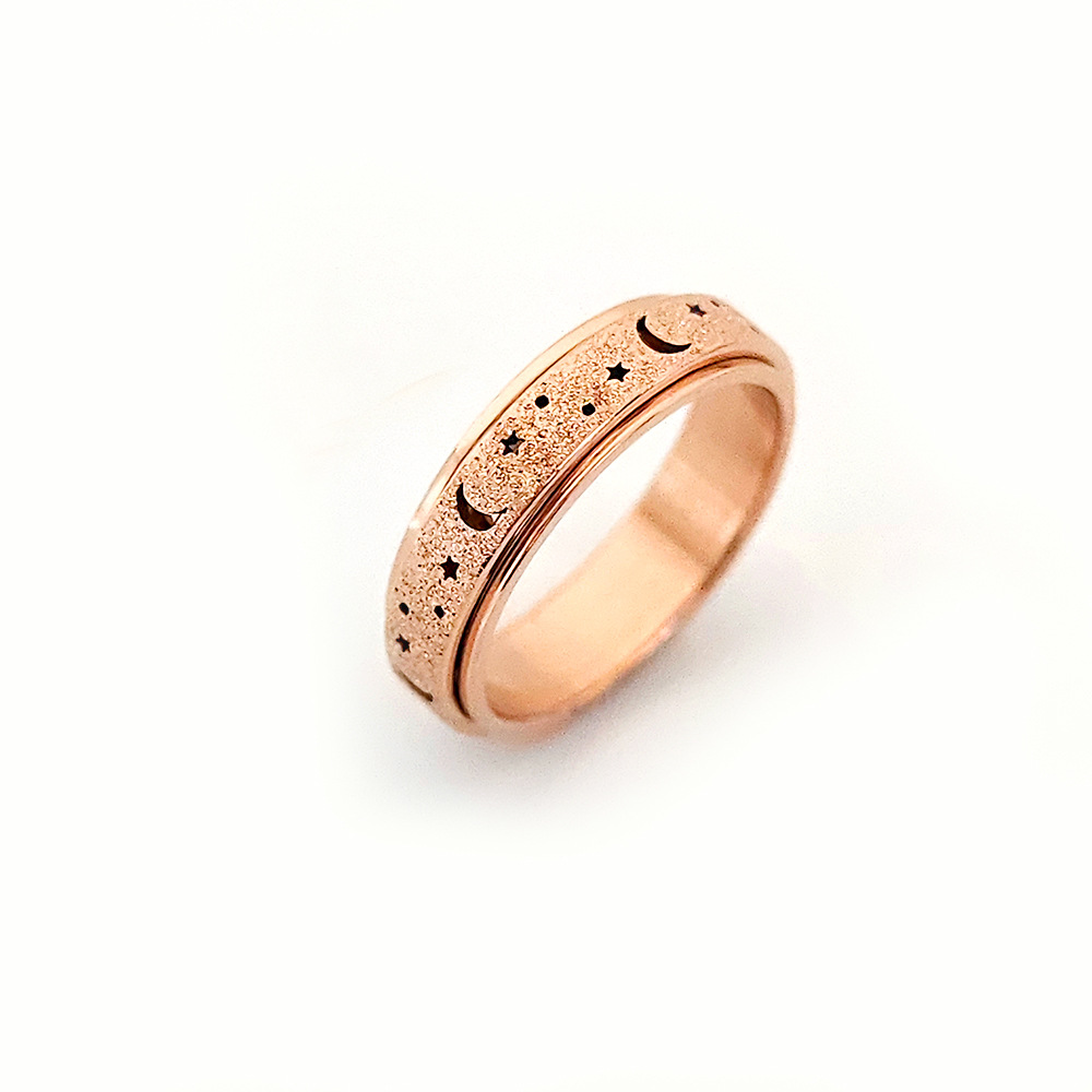 Frosted hollow stars and moon stainless steel rotatable stress relieving ring titanium steel finger ring female hand jewelry love ring gold ring desig