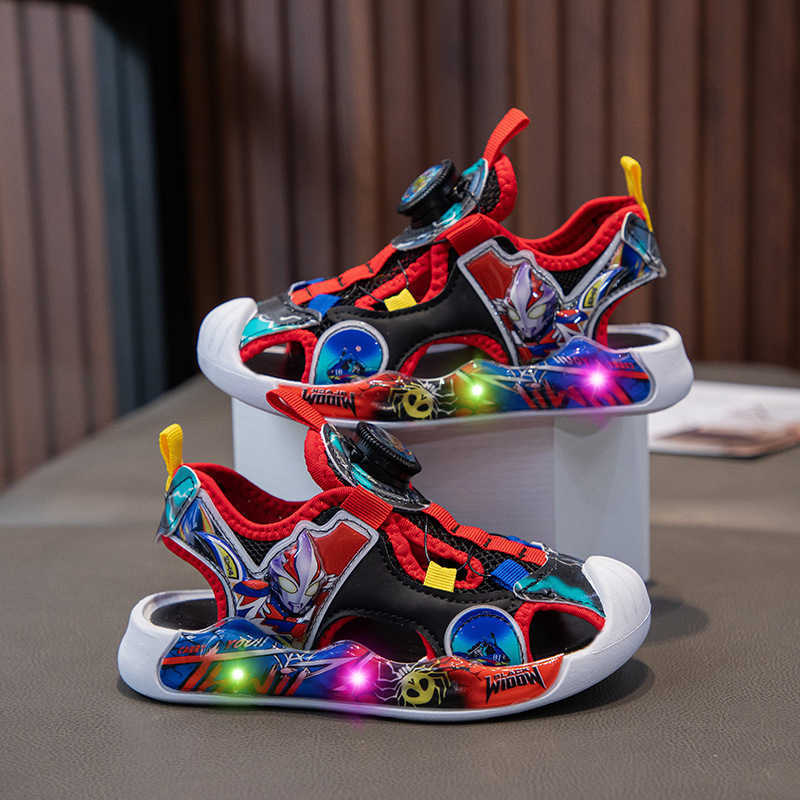 Sandals Childrens beach shoes boys sports sandals Ultraman summer hollow mesh illuminated anti kick cartoon frame shoes H250212