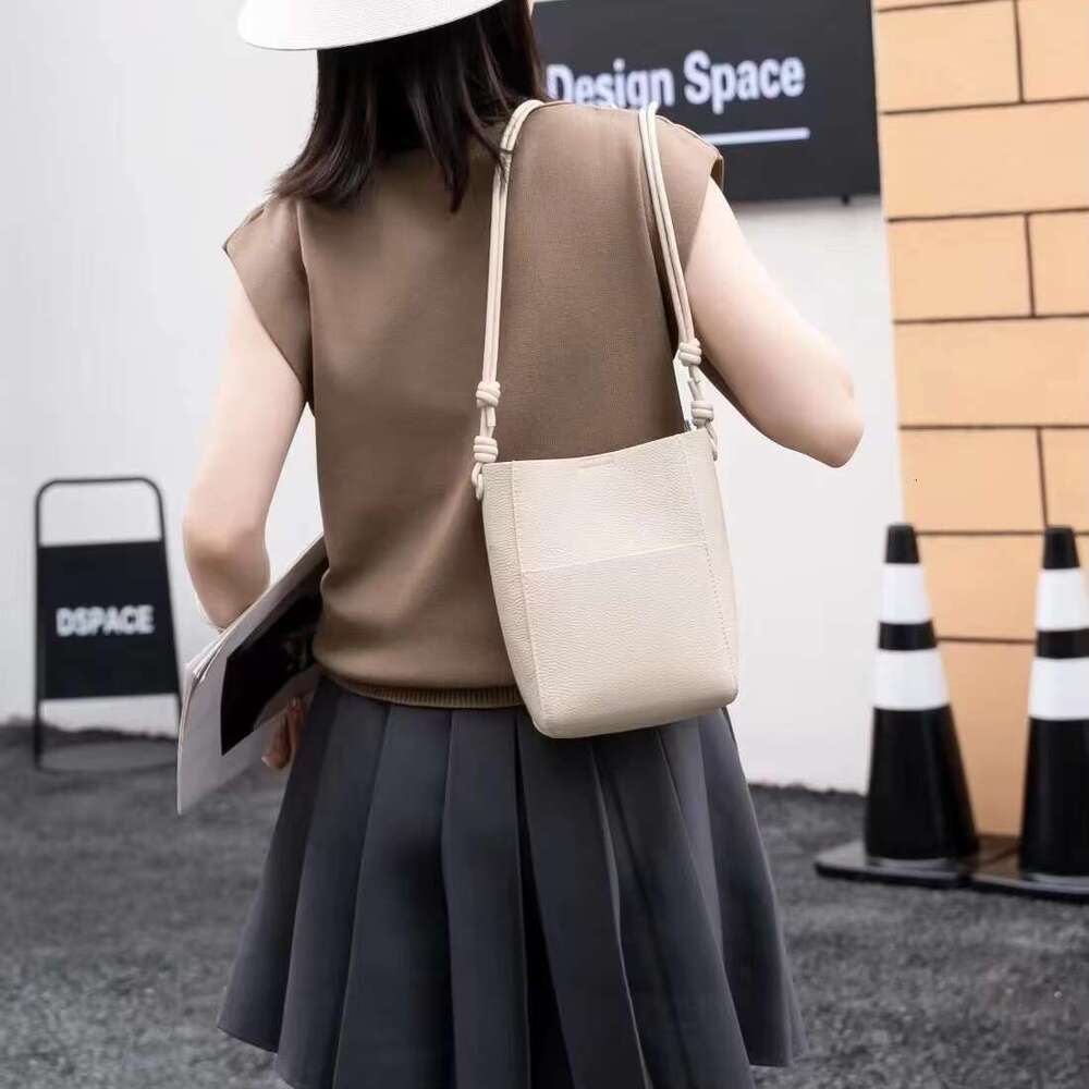 2024 Light-Colored Leather Bucket Female Fashion Simple Crossbody Bag Travel Mobile Phone Purses And Handbags