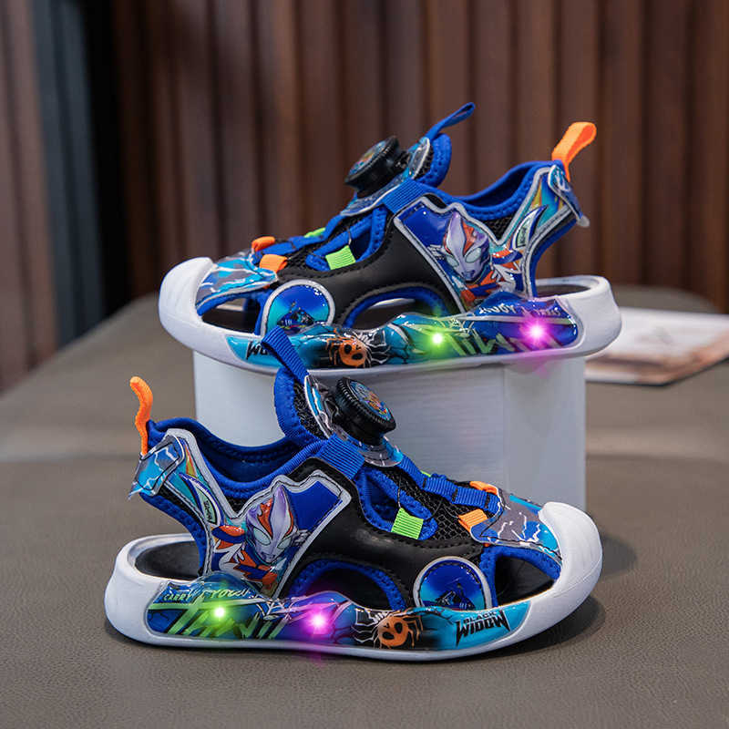 Sandals Childrens beach shoes boys sports sandals Ultraman summer hollow mesh illuminated anti kick cartoon frame shoes H250212