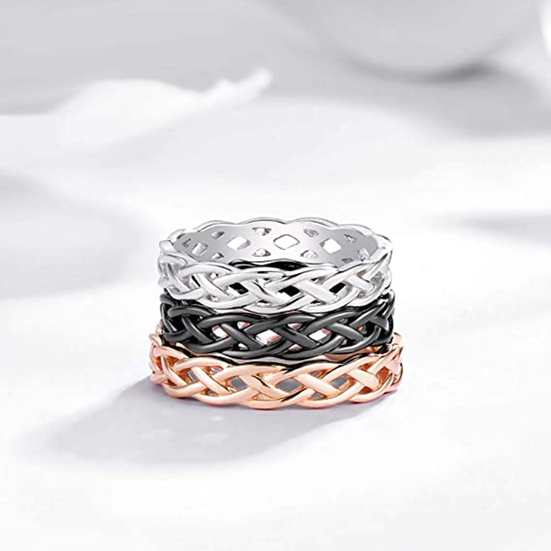 Europe and the United States fashion titanium steel jewelry minimalist weaving hollow wave effect Celtic knot couple ring love ring gold ring designer