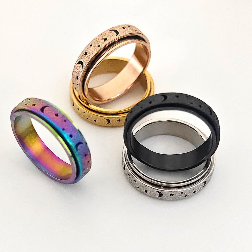 Frosted hollow stars and moon stainless steel rotatable stress relieving ring titanium steel finger ring female hand jewelry love ring gold ring desig