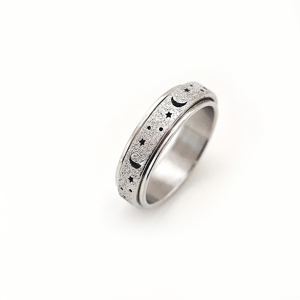 Frosted hollow stars and moon stainless steel rotatable stress relieving ring titanium steel finger ring female hand jewelry love ring gold ring desig