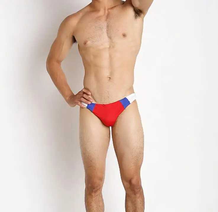 Mens swimming trunks are paired with brightly colored low-waisted swimming trunks and sexy quick-dry tight swimming trunks W250214