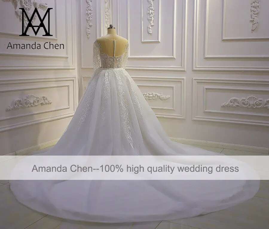 Customized Wedding Dress with Detachable Skirt and High Quality Long Sleeve Lace Appliques