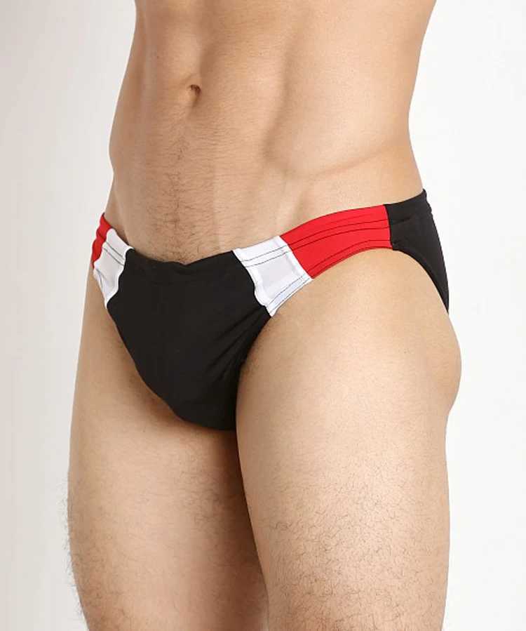 Mens swimming trunks are paired with brightly colored low-waisted swimming trunks and sexy quick-dry tight swimming trunks W250214