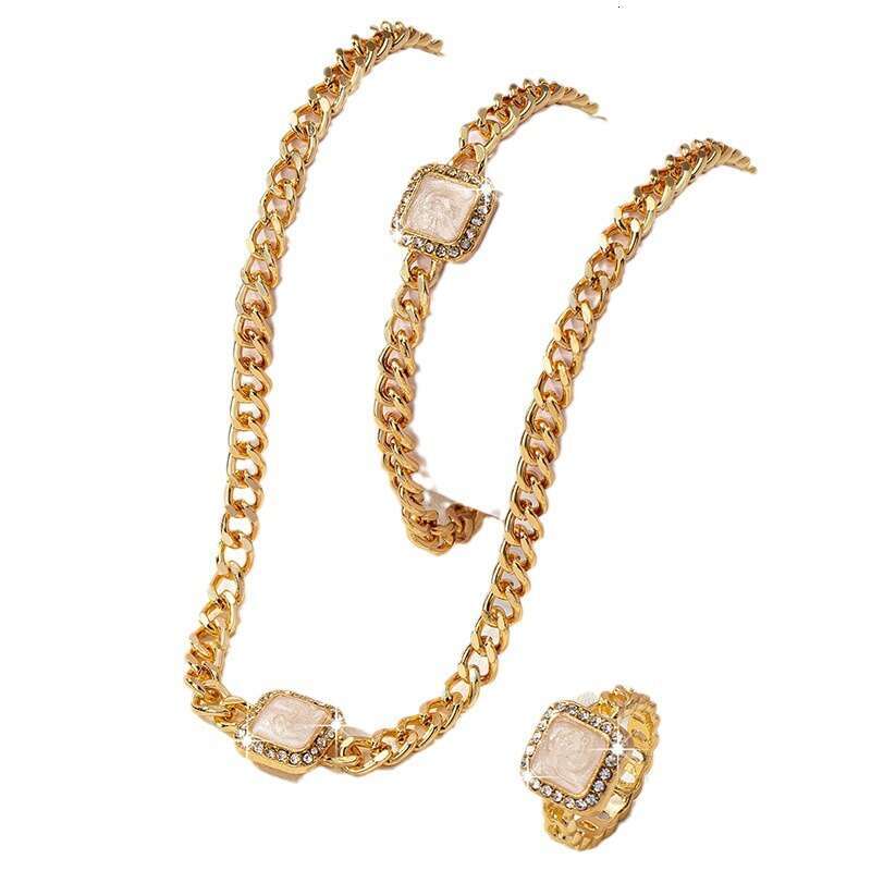 A necklace, bracelet, a dia inlaid enamel ring, geometric girl