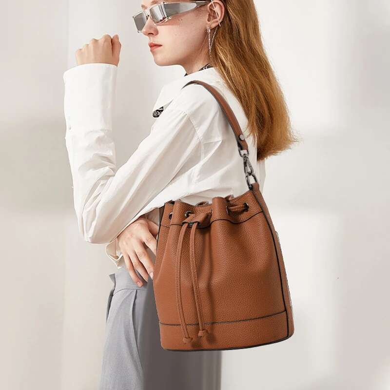 First-Layer Crystal Vegetable Tanned Cowhide Balloon 2025 New Niche Design Retro Drawstring Mini Hand Bucket Bag