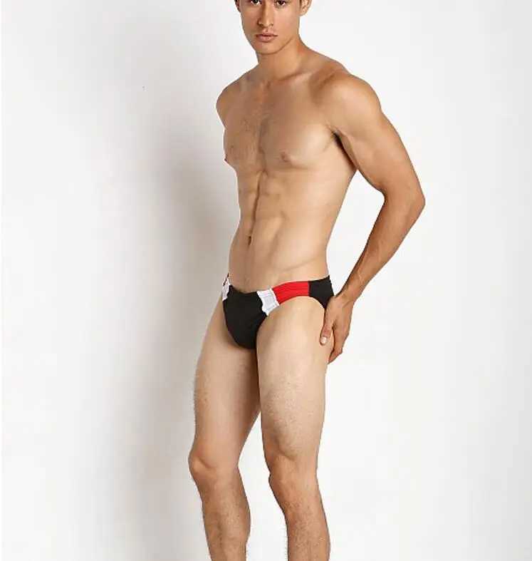 Mens swimming trunks are paired with brightly colored low-waisted swimming trunks and sexy quick-dry tight swimming trunks W250214