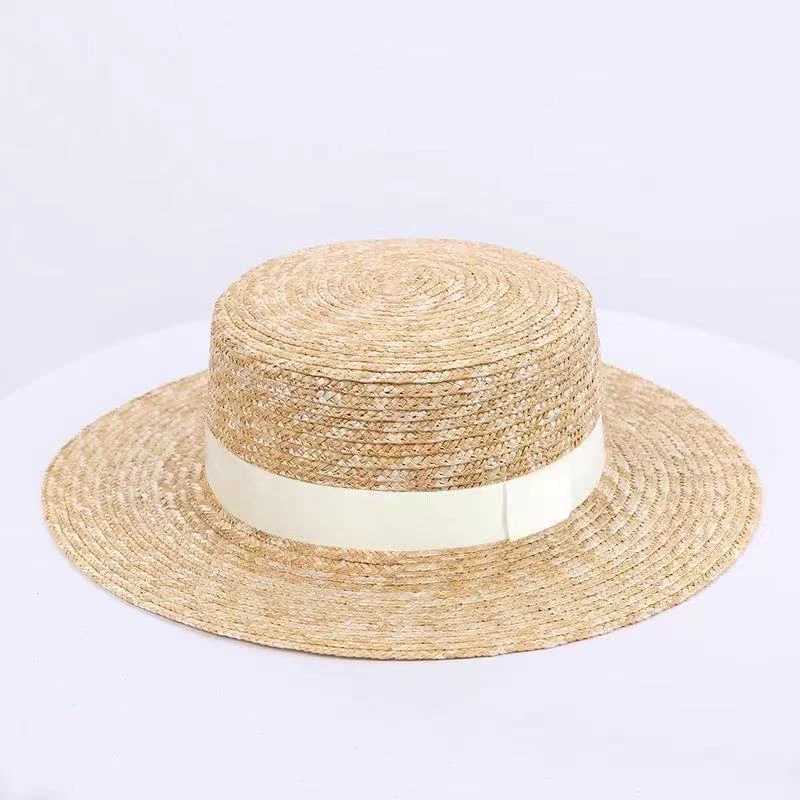 Summer unisex handmade natural wheat straw hat womens sun hat with bow wide eaves flat top hat mens beach solid hat sunscreen A1 Y250213