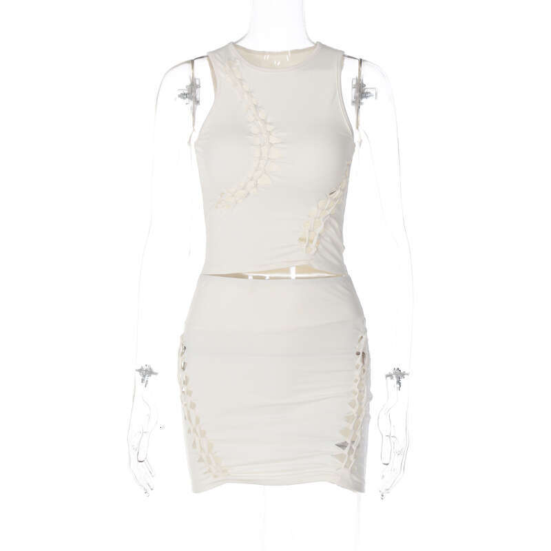 European and American style women's spring/summer product fashionable solid color hollow out round neck sleeveless top slim fit skirt set 2025 te
