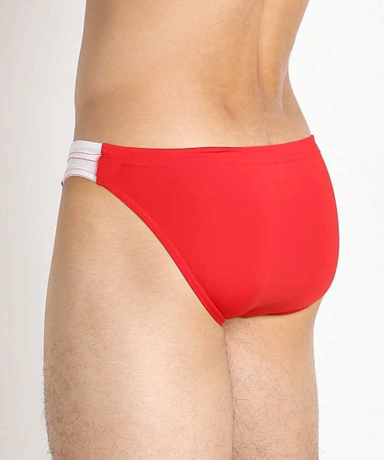 Mens swimming trunks are paired with brightly colored low-waisted swimming trunks and sexy quick-dry tight swimming trunks W250214