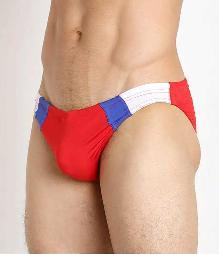 Mens swimming trunks are paired with brightly colored low-waisted swimming trunks and sexy quick-dry tight swimming trunks W250214