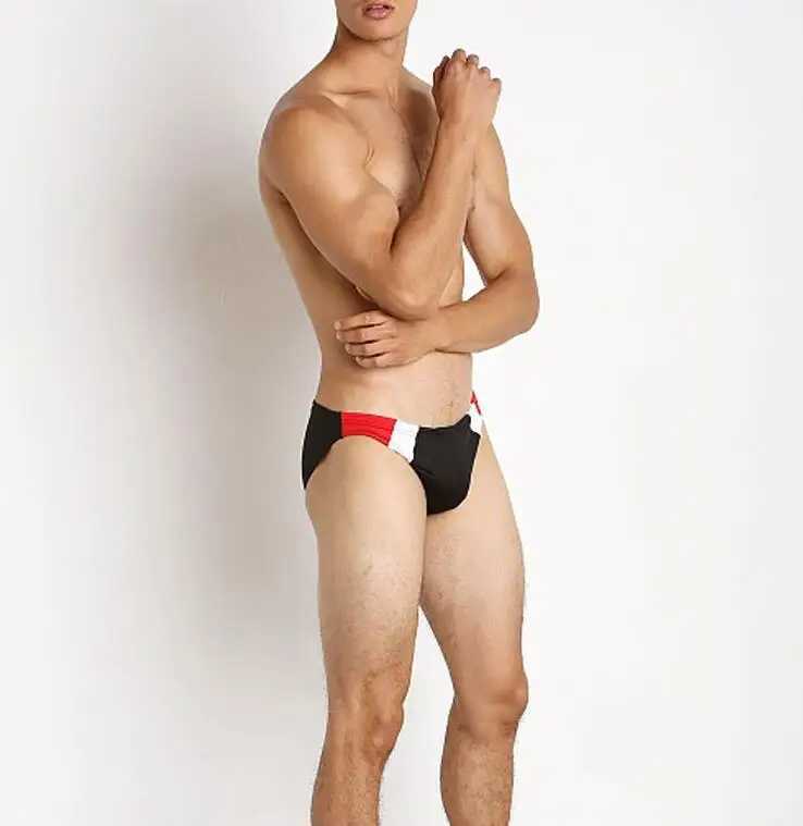 Mens swimming trunks are paired with brightly colored low-waisted swimming trunks and sexy quick-dry tight swimming trunks W250214