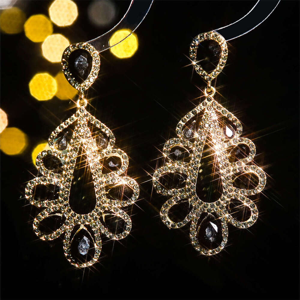 Fashionable shiny glass rhie long water droplet feminine temperament earrings, elegant and trendy earrings