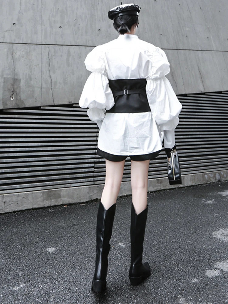 EAM Women Black Button Split Joint Asymmetrical Loose Fit Vest Sleeveless Fashion Spring Autumn 1K371 250207