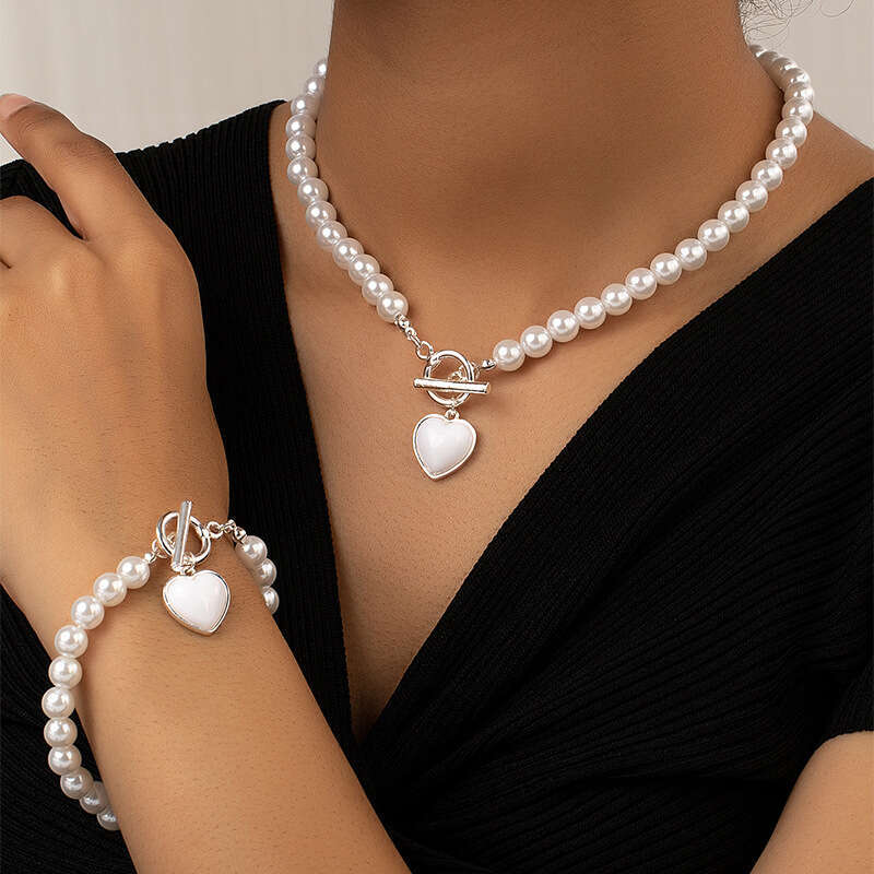Fashionable and trendy pearl bracelet necklace set female niche high-end feeg, light style, love collarbone chain for daily wear