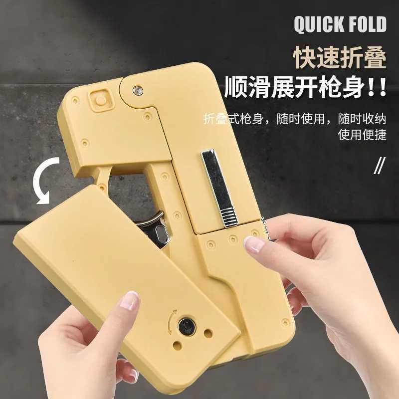 Folding Gun IC380 Toys Pistol Mobile Phone Model Bullet Soft Ammo Shelling Cool Phone 14Pro Max Gift Outdoor Game Sports Toy GunT250214