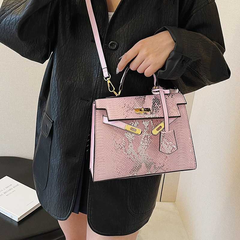 Designer Bag for women new trendy hot large capacity snake pattern high-end sense handbag fashionable single shoulder crossbody Kelly bag