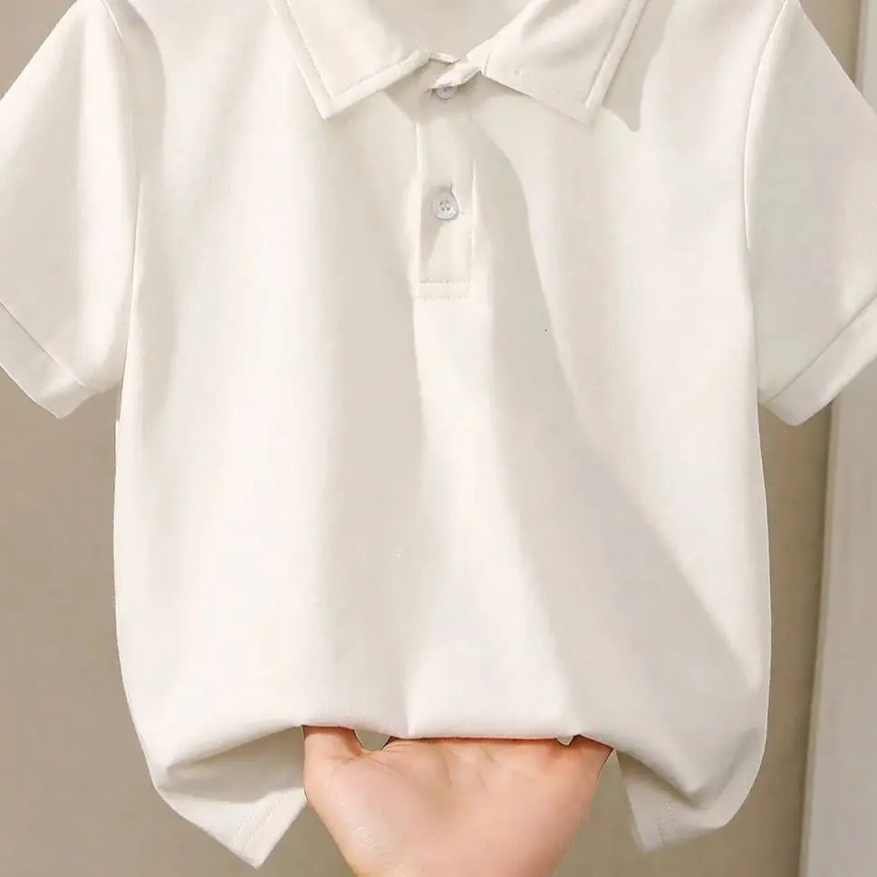 Childrens solid color POLO shirt boy handsome fashion sports T-shirt girl lapel casual and comfortable half sleeve. 250213