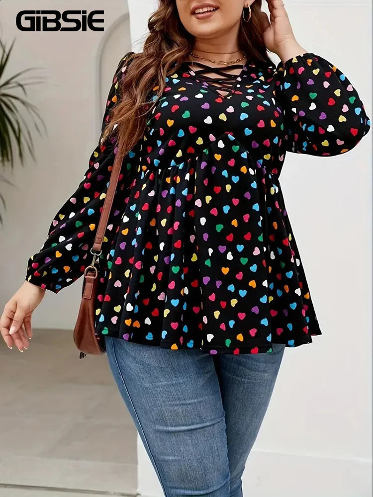 GIBSIE Plus size heart-shaped printed V-neck Peplum shirt for womens spring autumn sweet casual long sleeved womens pleated hem top 250210