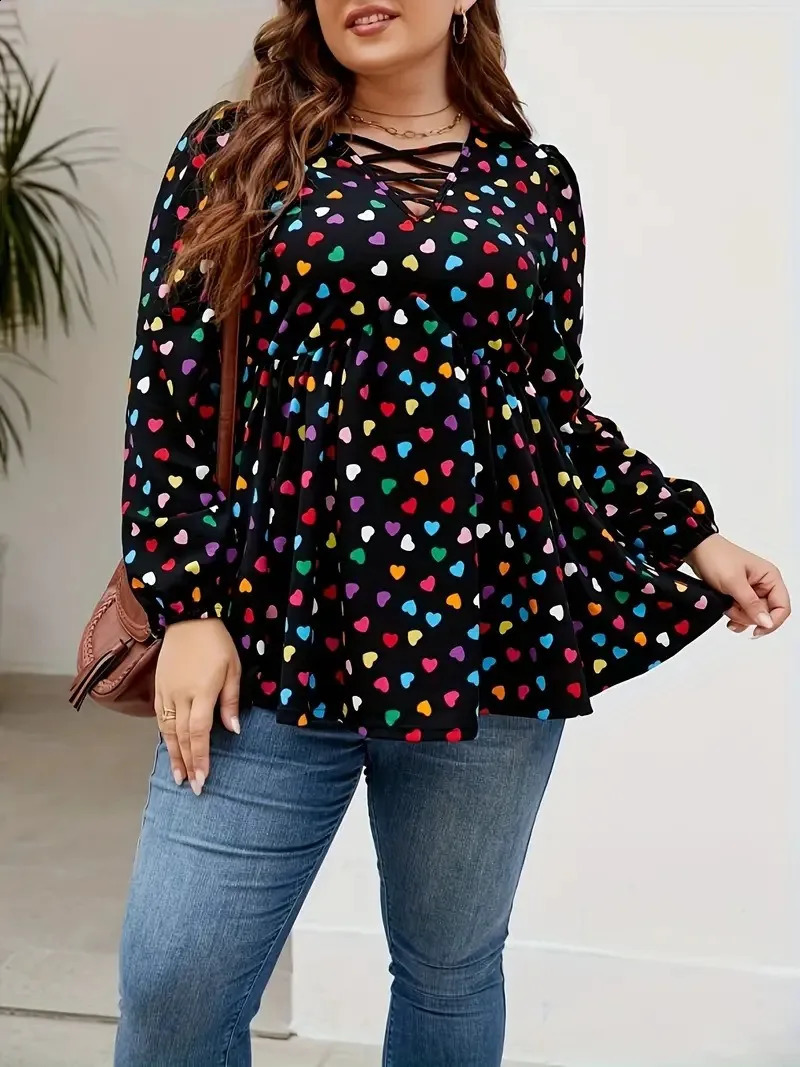 GIBSIE Plus size heart-shaped printed V-neck Peplum shirt for womens spring autumn sweet casual long sleeved womens pleated hem top 250210