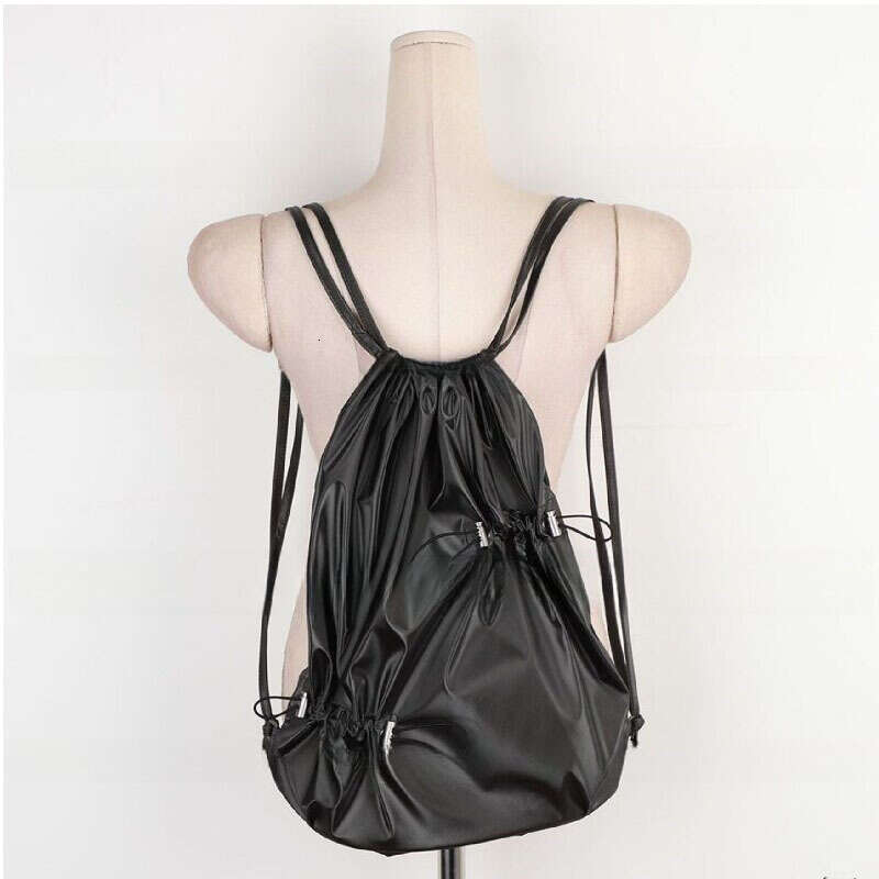 South Korea's East Gate New Irregular Drawstring Folded Strap Mouth Casual Large Capacity Versatile Bright Face Backpack Trendy