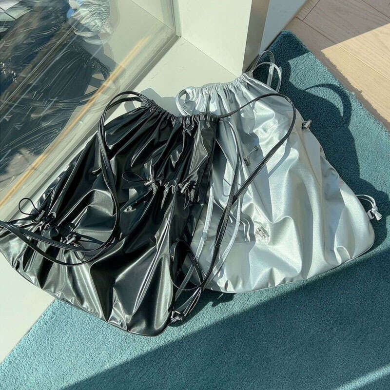 South Korea's East Gate New Irregular Drawstring Folded Strap Mouth Casual Large Capacity Versatile Bright Face Backpack Trendy