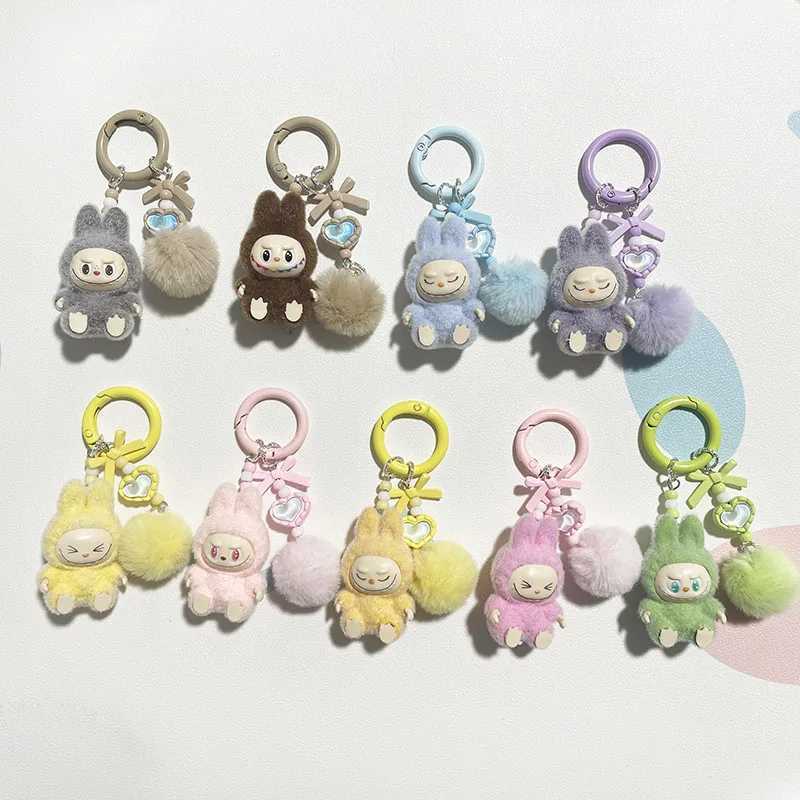 Keychains Lanyards New Labubu Keychain Cartoon Creative Mini ThreeDimensional Doll Schoolbag Pendant Car Key Chain Women and Men for Gifts S251103