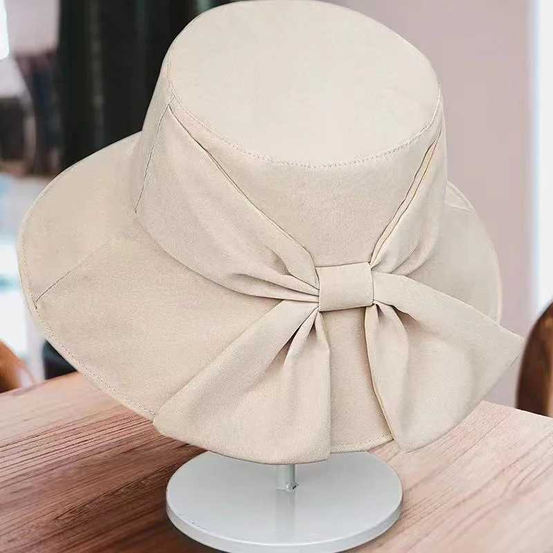 New Summer Womens Bow Fashion Wide Brown Sun Hat Outdoor Beach Fishermans Hat UV Protective Sun Hat Bucket Hat Gift W250217